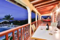 St-Lucia-Homes-Real-Estate-Sea-Star-ALR010-Balcony-Dining-pool-night-850x570